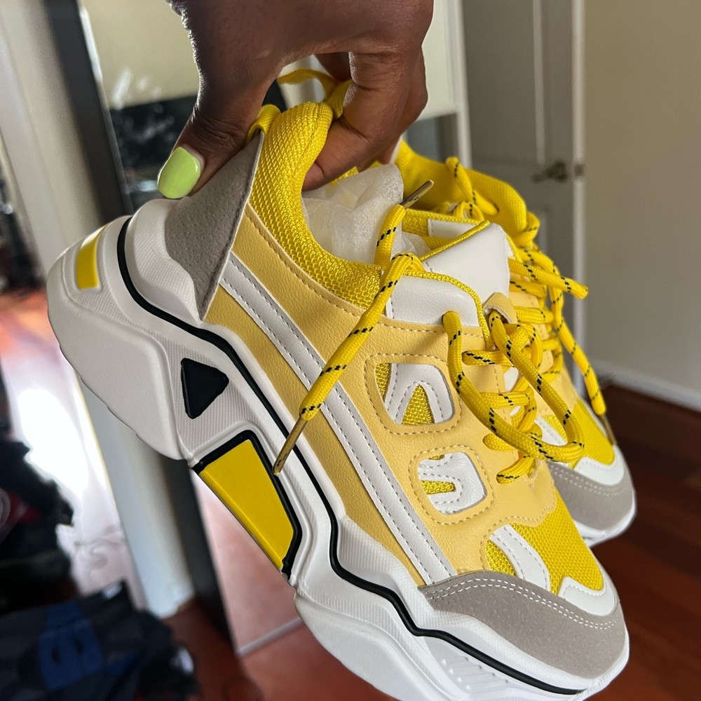 Yellow and white sneakers